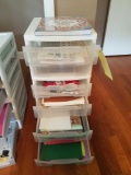 Plastic organizer of paper, coloring book and stickers