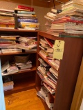 Contents of closet, mostly cookbooks, two bookshelves, one basket