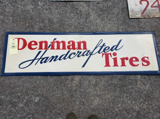 Embossed Denman Tires Tin Sign