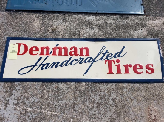 Embossed Denman Tires Tin Sign