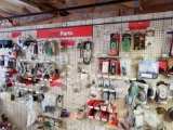 Assorted Mower Parts, Contents on Wall