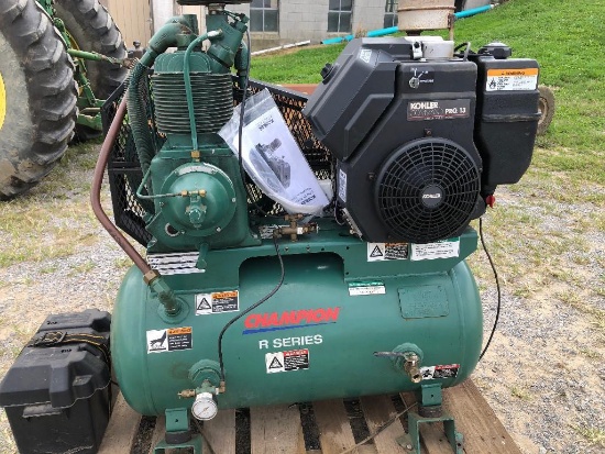 Like new Champion R-series Air compressor w/ Kohler Command Pro 13 HP gas engine, electric start