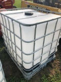 300 gal. plastic tote with cage, good grade