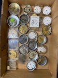 Box of watch movements and parts