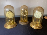 3 globe anniversary clocks