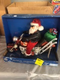 Christmas houses, Santa motorcycle and animated bears