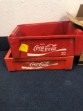 2 plastic Coca-Cola beverage crates