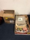 Box of record albums and box of vintage magazines and paper items