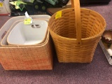 The company store three orange woven containers and one large Longaberger basket with handle