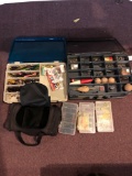 Fishing lures, tackle boxes, and tackle bag