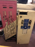 Condom vending machine, Tampax vending machine, and Singer sewing machine