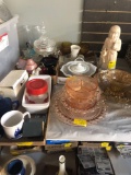 Collection of glassware, pink depression glass, Sea World, etc