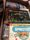 Large box of vintage board games and toys