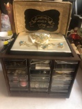 Bin full of sewing items and buttons and Imperial jewels jewelry set