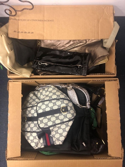 2 boxes of purses