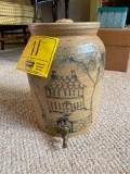 Stoneware urn with home scene