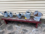 2 Benches with water cans
