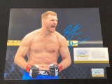 Miocic signed 10 x 8 photo. Forensic DNA COA #0477.