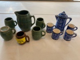 Green pottery barrel shaped pitcher w/ four mugs, Schmid Design Folio blue pitcher w/ four mugs