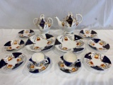 (14) Pc. Unmarked Gaudy style set. Good condition except Teapot has hairline cracks on spout