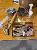 Kitchen utensils, ice cream scoops, Guardian oven pan, Pyrex measure pitcher, etc.