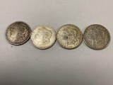 (4) Morgan silver dollars (two 1921, 1921-D, 1921-S).