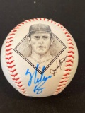 Nolan Ryan signed commemorative baseball. VS Autograph COA sticker #A23615.