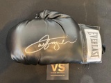 Joe Frazier signed boxing glove. VS Authentication COA #A15578.