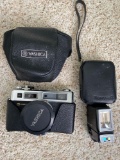Yashica Electro G 35 mm camera, Honeywell flash attachment.