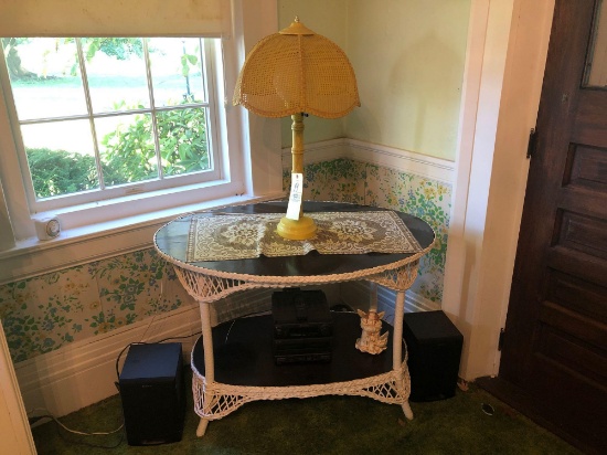 Wicker lamp table, yellow lamp, Sony stereo