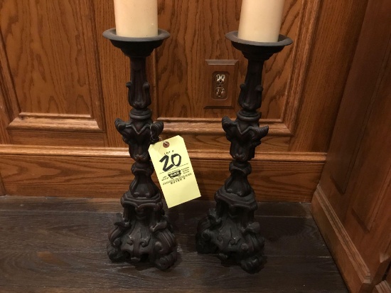 Pair of heavy carved candelabras