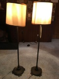 Matching pair of metal floor lamps