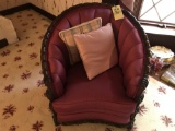 Upholstered chair with wood carved trim