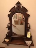 Victorian wall mirror with hank drawers