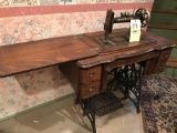 Early new home sewing machine