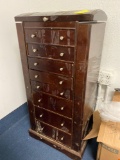 Jewelry armoire with costume jewelry inside, armoire does have sticky residue on it