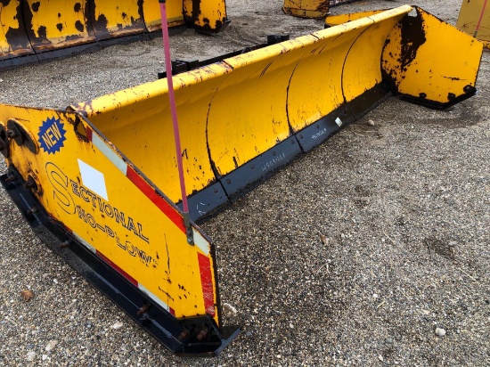 Arctic 10 ft. Skid steer snow pusher.