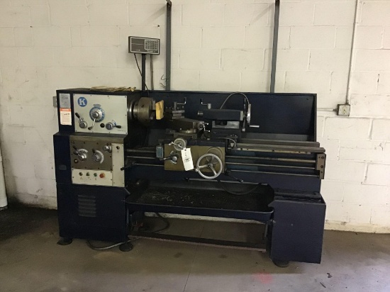 1990 Enco lathe, 4' bed, digital readout. 3 & 4 jaw chucks. Center rest attachment and misc. tooling