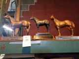 3 horse trophies