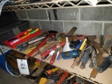 Shelf of tools and small toolbox