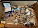 Assorted costume jewelry, wristwatches, lighter, cufflinks, and more