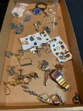 One box of costume jewelry, cufflinks, pins, some sterling