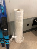 Large roll of tubular plastic