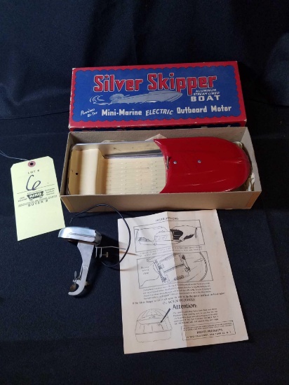 Rare MIB Silver skipper aluminum stream lined boat with mini marine motor, great condition