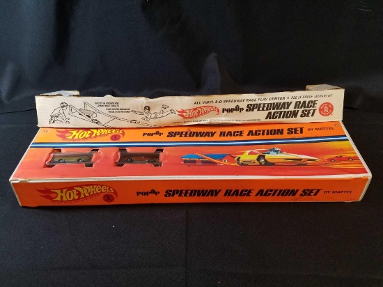Hot Wheels popup speedway race action set by Mattel, with 2 Redline cars