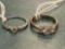 (2) Unmarked rings. Stones are not diamonds.