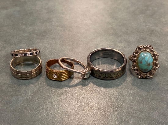 (6) Rings, not gold, one marked sterling.