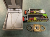 Cigar cutter, heart shaped necklace w/ earrings, (2) Rapala baits.