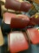 5 red leather stacking chairs