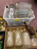2 bins of old glass bottles